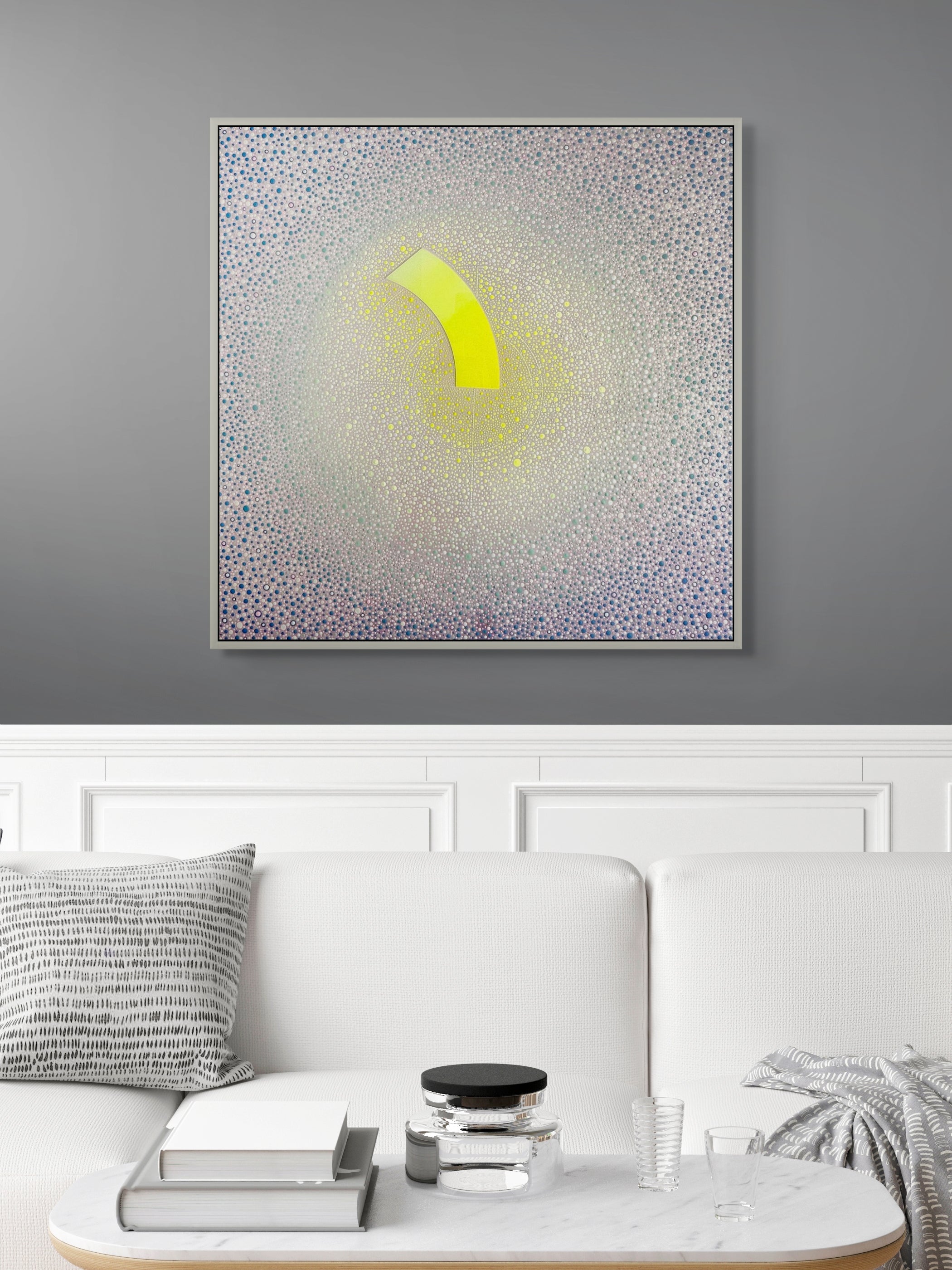 Sky Meadow by Ewa Tarsia – Abstract art piece with a yellow arc on a gray wall above a white sofa.