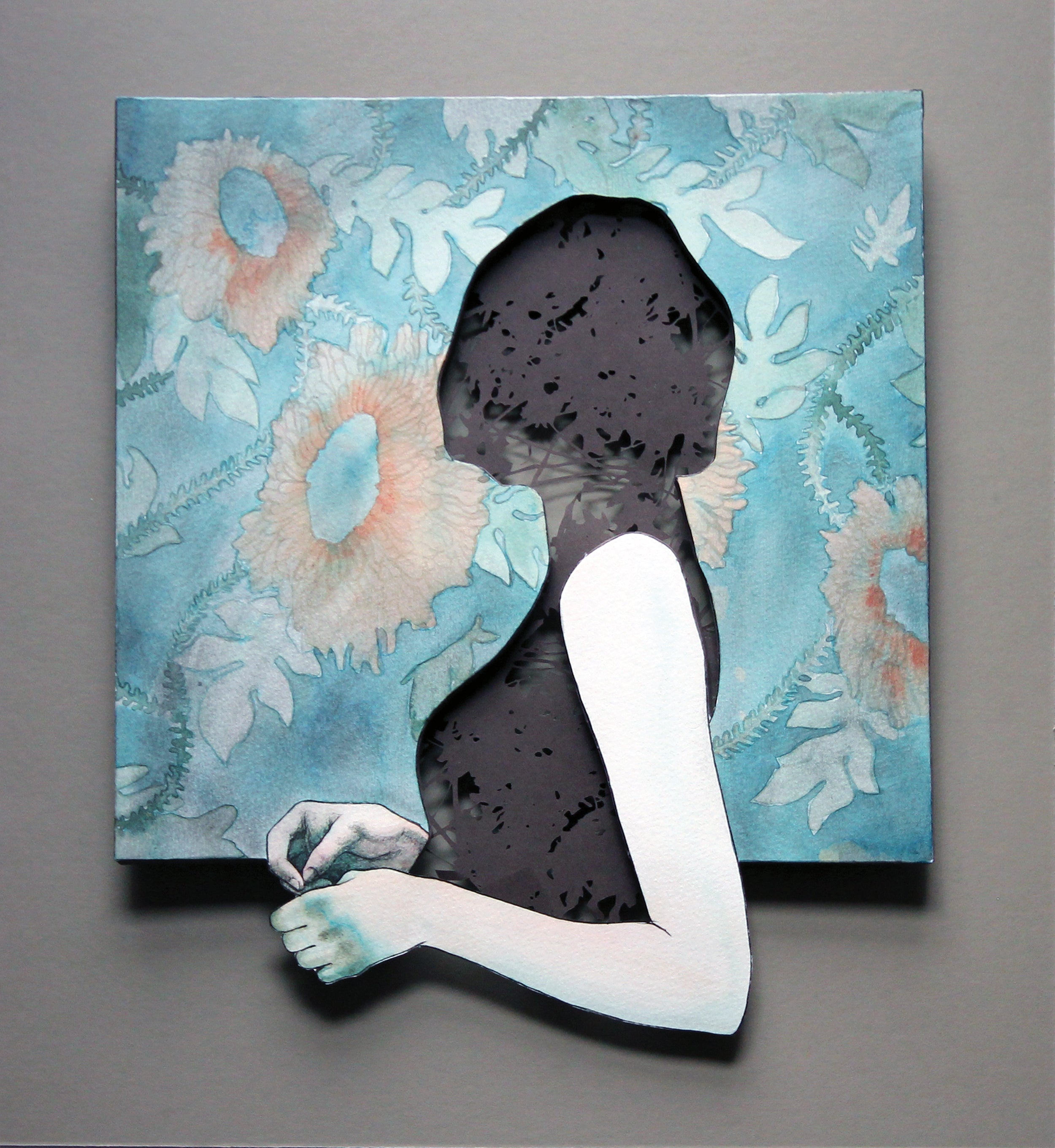 Artistic depiction of a silhouette with floral background original cut paper artwork by Christine Kim